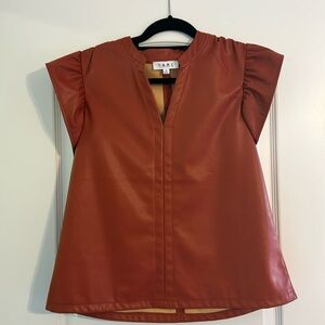 Rust color ruffle sleeveless leather top